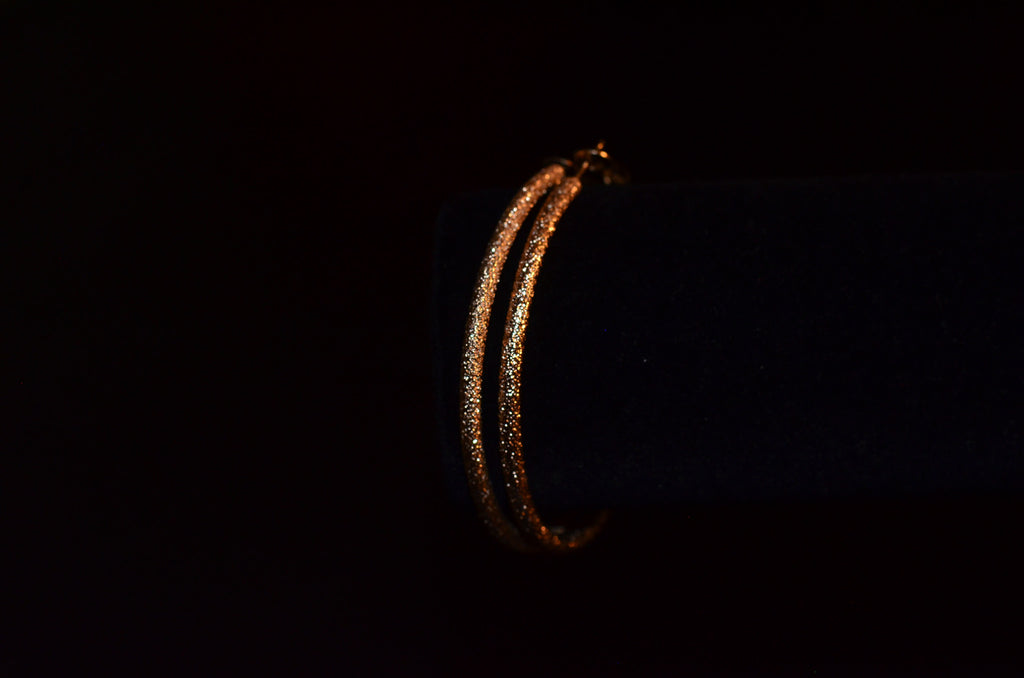Gold hoop earring