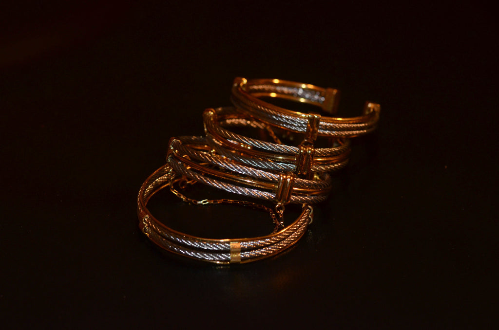 One gold and silver bangle