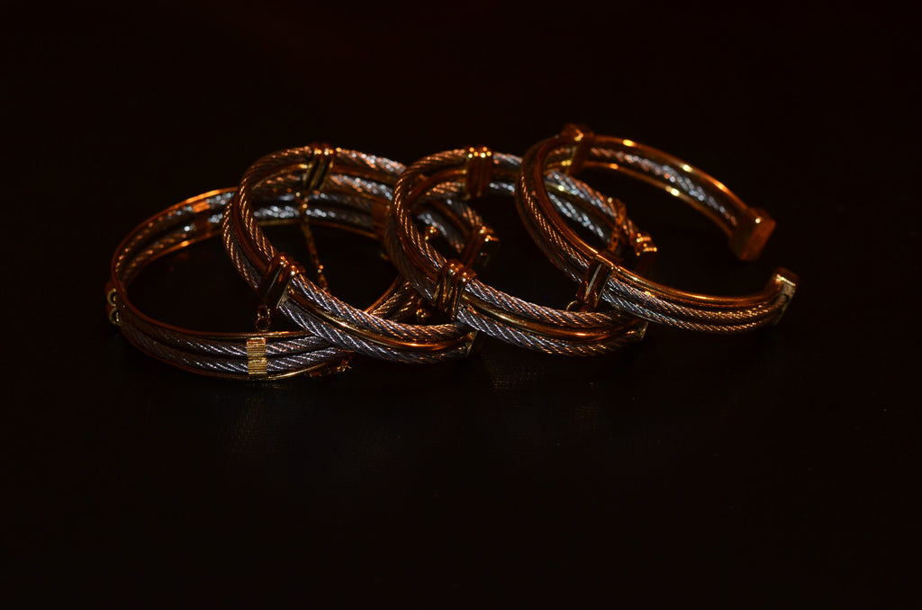 One gold and silver bangle
