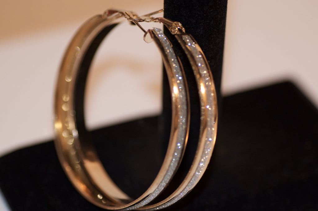 Gold and silver hoop earring