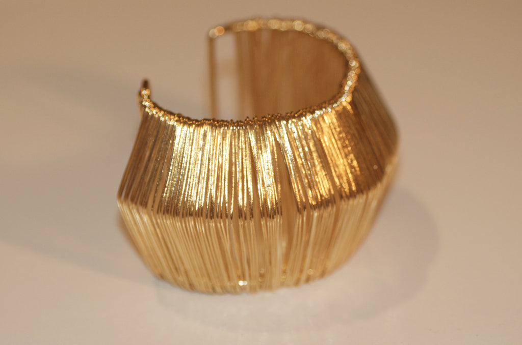 Gold cuff bracelet