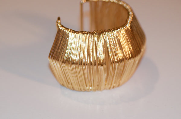 Gold cuff bracelet