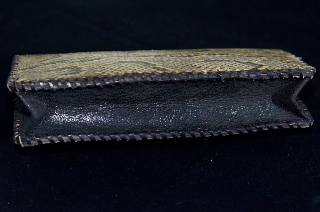 Sade Snake skin clutch