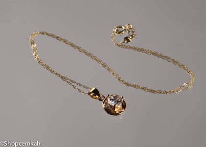 Gold and white crytal shaped necklace