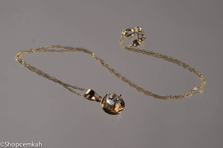 Gold and white crytal shaped necklace